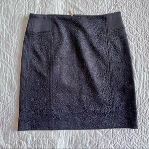 Black scuba mini with floral design